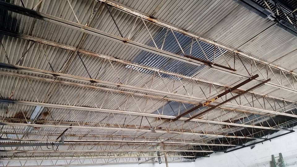 Before: unfinished shop ceiling