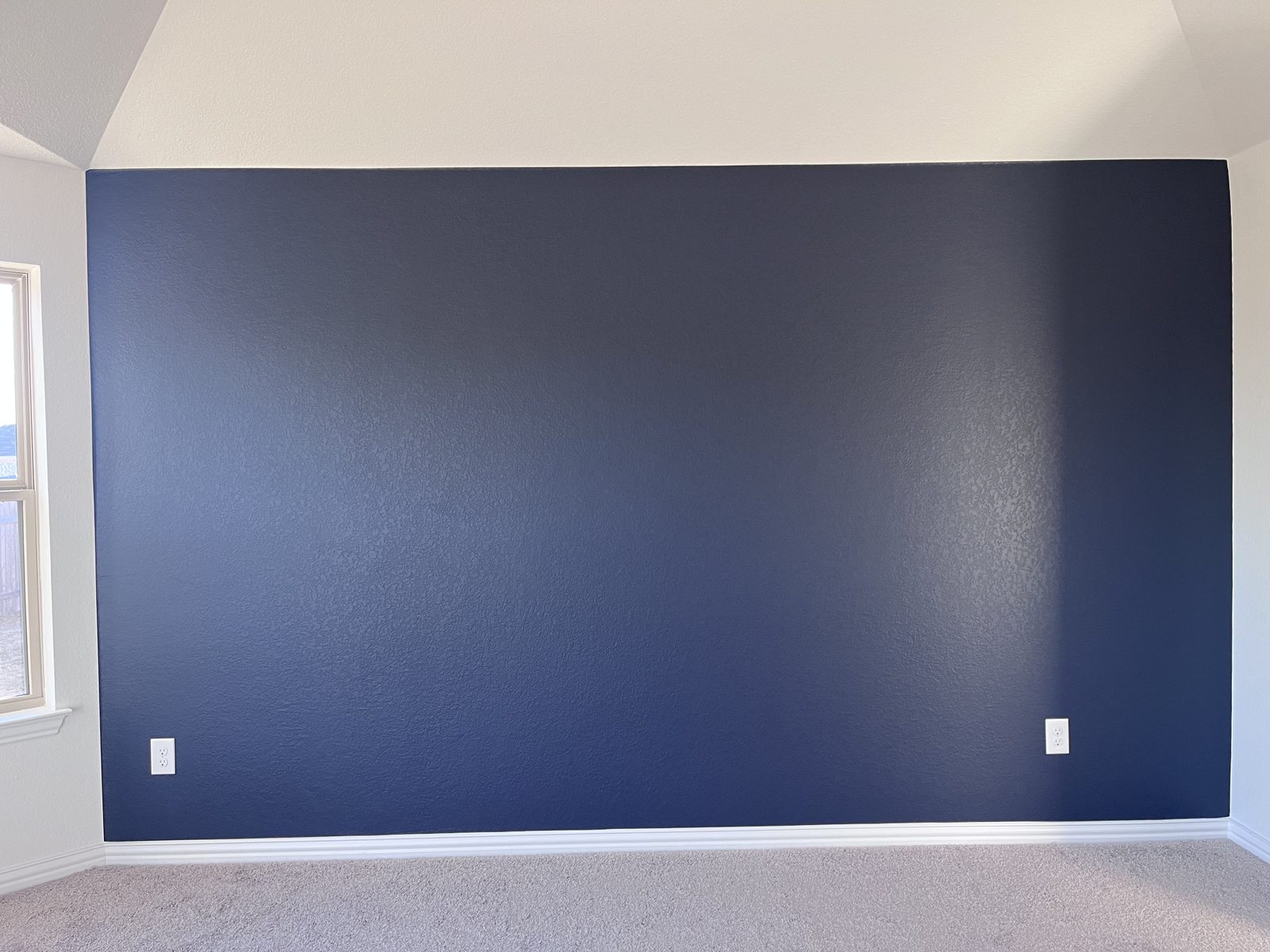 Dark navy painted room